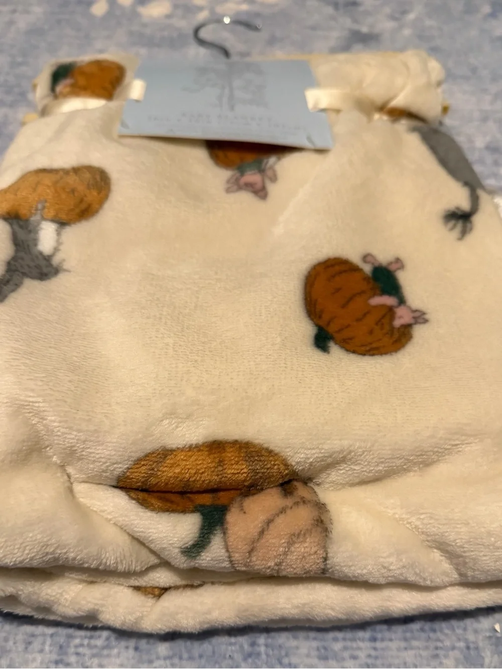 Disney Cream Plush Baby Blanket with Pooh & Pumpkin Design